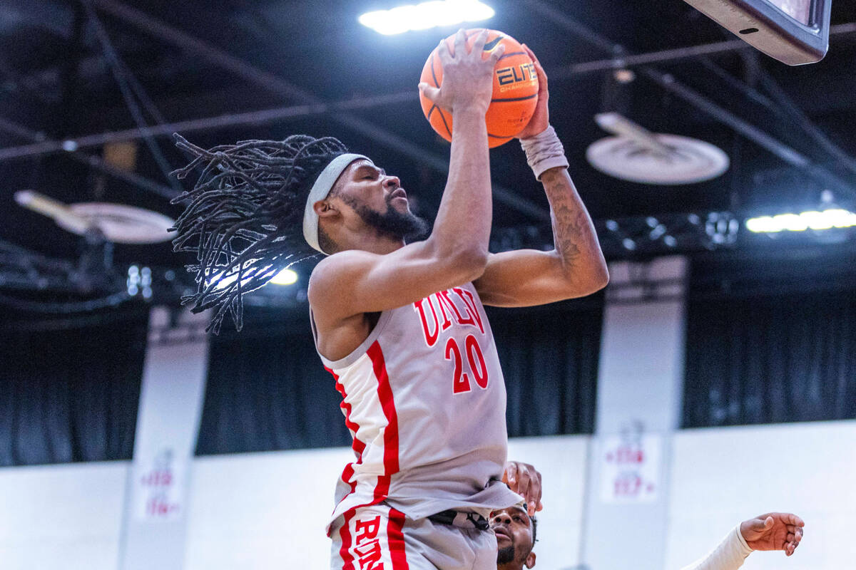 UNLV Rebels forward Keylan Boone (20) posts up for a basket against the Bethesda University Fla ...