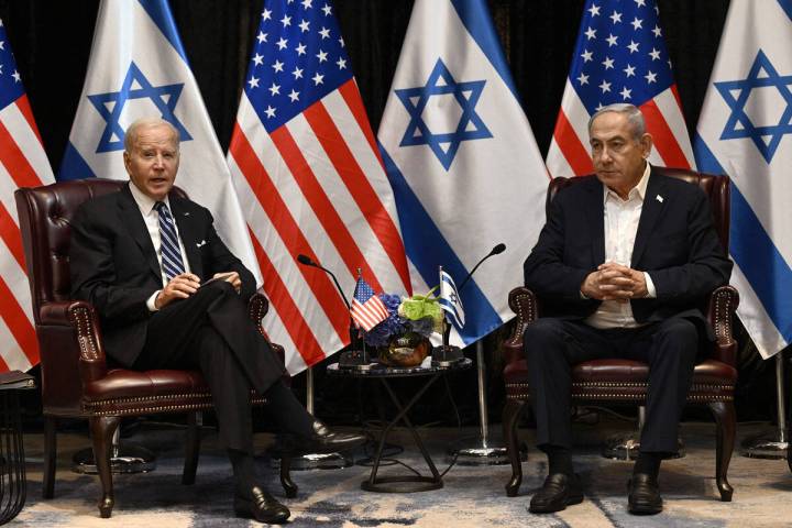 President Joe Biden, left, listens to Israel's Prime Minister Benjamin Netanyahu as he joins a ...