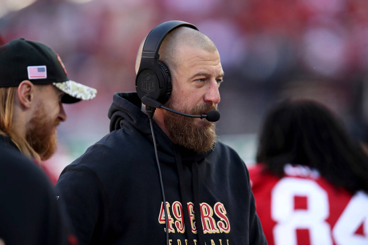 San Francisco 49ers tight ends coach Brian Fleury stands on the sideline during an NFL football ...