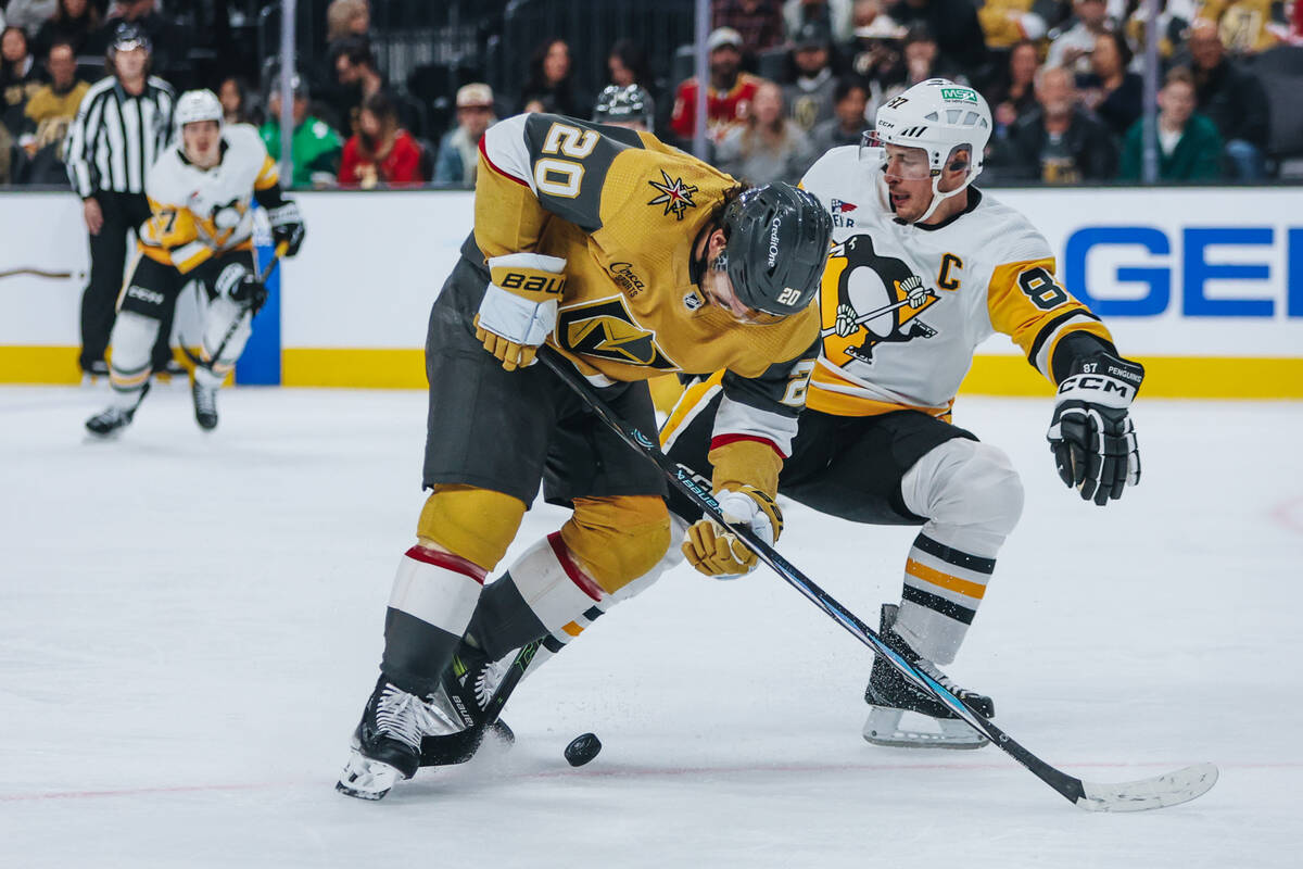 Golden Knights center Chandler Stephenson (20) looks for the puck beneath him during a game aga ...