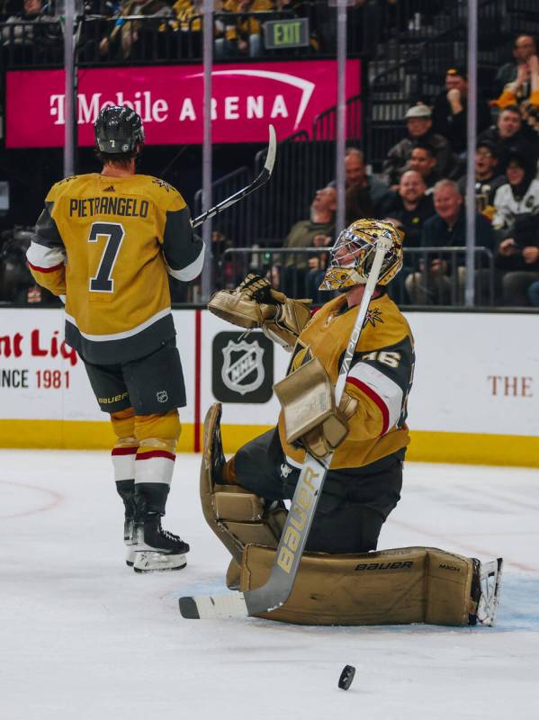 Golden Knights goaltender Logan Thompson (36) reacts after a save during a game against the Pit ...