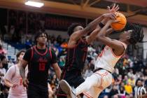 Coronado’s Jonny Collins (0) blocks Bishop Gorman’s Nick Jefferson (10) during a ...