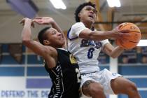 Sierra Vista guard EJ Dacuma (0) shoots against Clark guard De'Shaun Tolever (21) during the fi ...