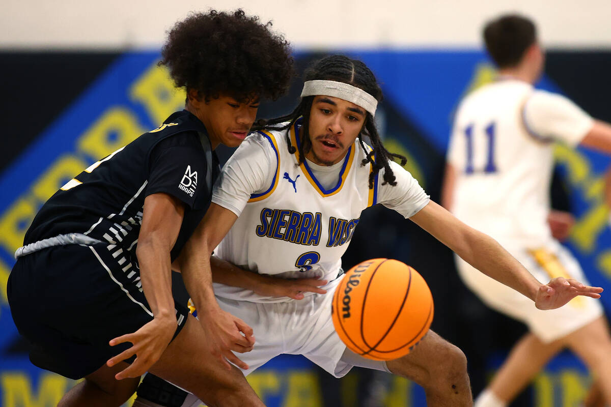 Sierra Vista guard Khamari Taylor (3) steals the ball from Clark's Sir Montgomery (2) during th ...