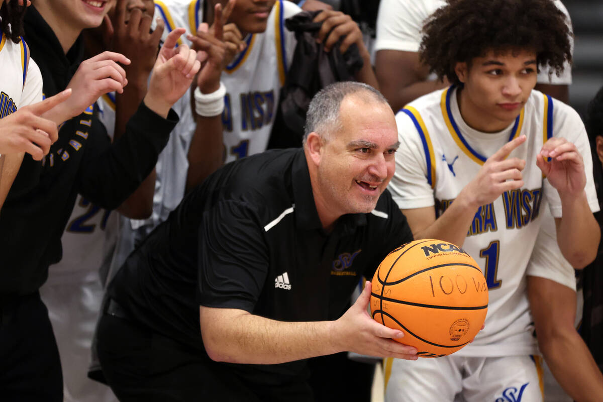 Sierra Vista head coach Joseph Bedowitz celebrates his 100th career win after his team defeated ...