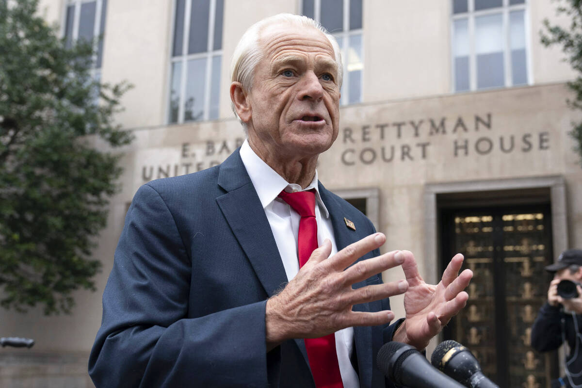 Former Trump White House official Peter Navarro talks to the media as he arrives at U.S. Federa ...