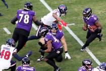 Baltimore Ravens quarterback Lamar Jackson (8) runs during an NFL divisional round playoff foot ...