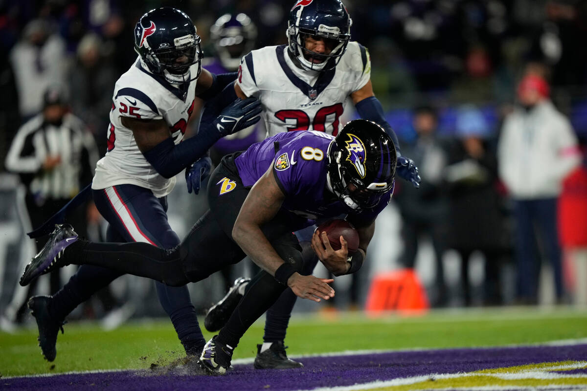 Baltimore Ravens' Lamar Jackson plays during an NFL football AFC divisional playoff game, Satur ...