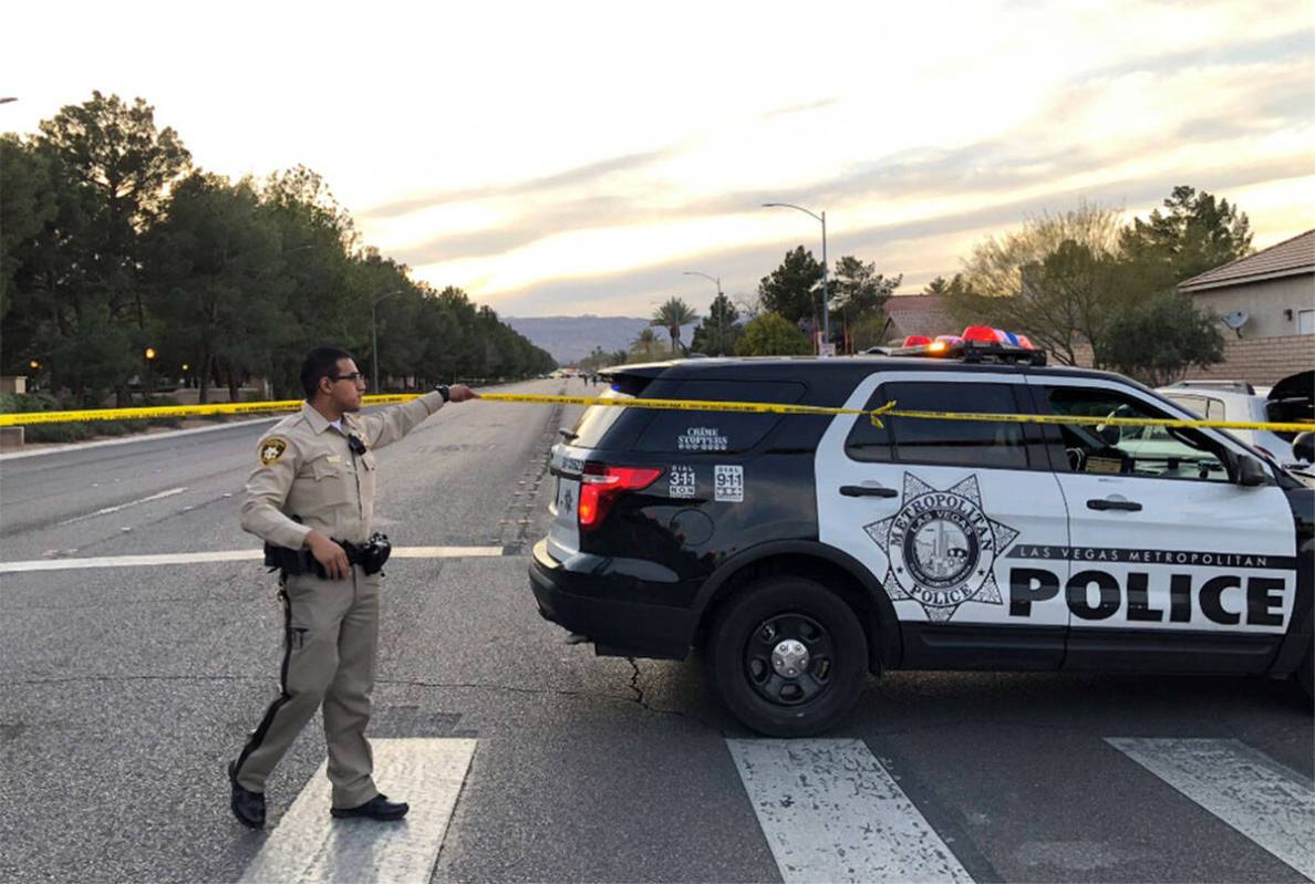 Police secure the scene of a fatal crash at Tropicana Avenue and Buffalo Drive in Las Vegas in ...