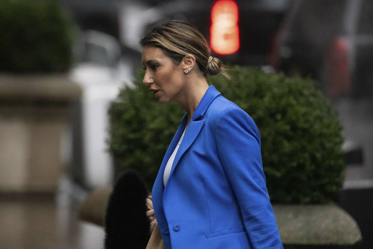 Alina Habba, one of ex-President Donald Trump's attorneys arrives at Trump Tower, Friday, Jan 2 ...