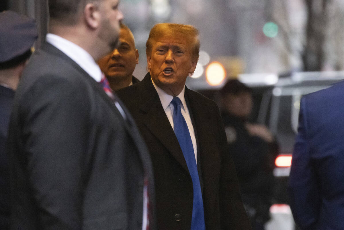 Former President Donald Trump leaves his apartment building, Thursday, Jan 25, 2024, in New Yor ...