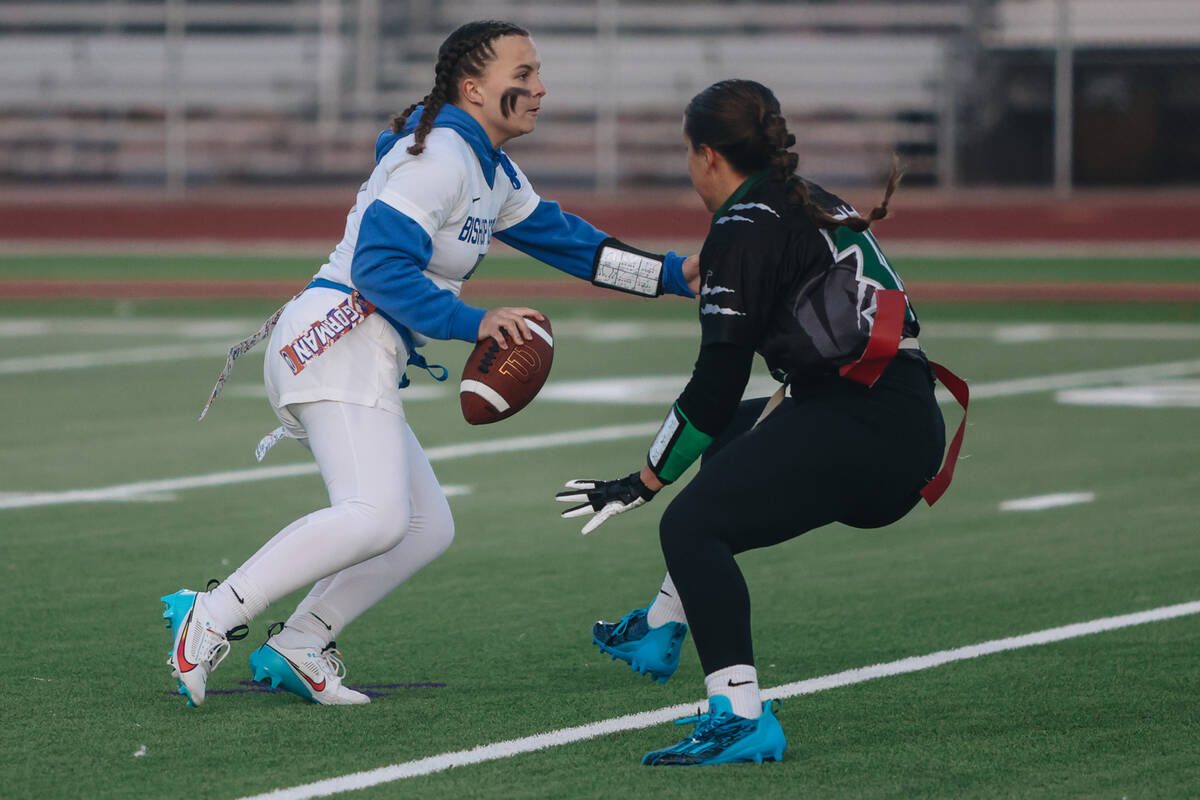 Bishop Gorman quarterback Avery Reed (7) makes a run with the ball during a flag football game ...