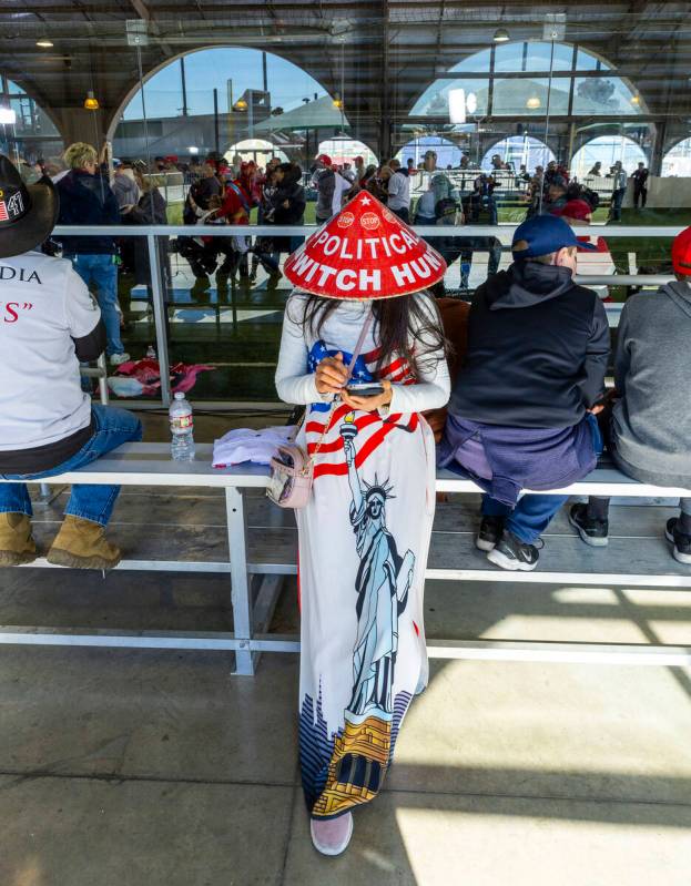 Supporter Kimberly Nguyen of Pasadena waits patiently for the arrival of Republican presidentia ...