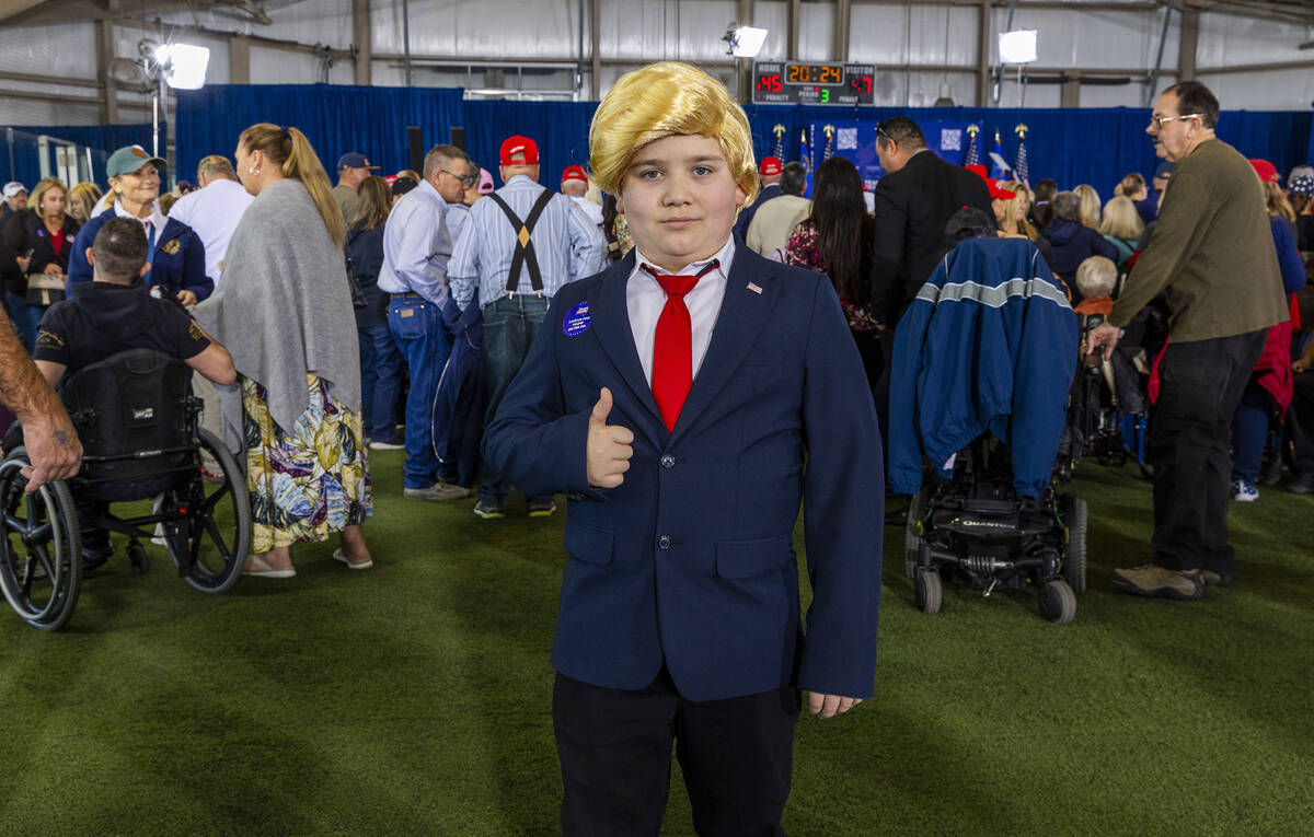 Shayne Skougard, 11, of Las Vegas awaits the arrival of Republican presidential candidate forme ...
