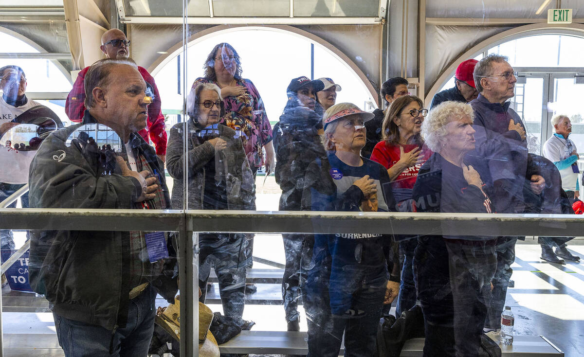 Supporters say the Pledge of Allegiance before Republican presidential candidate former Preside ...