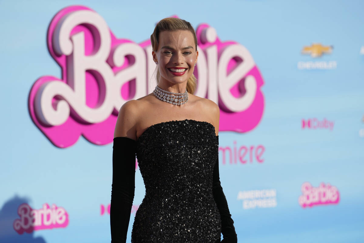 Margot Robbie arrives at the premiere of "Barbie" on Sunday, July 9, 2023, at The Shr ...