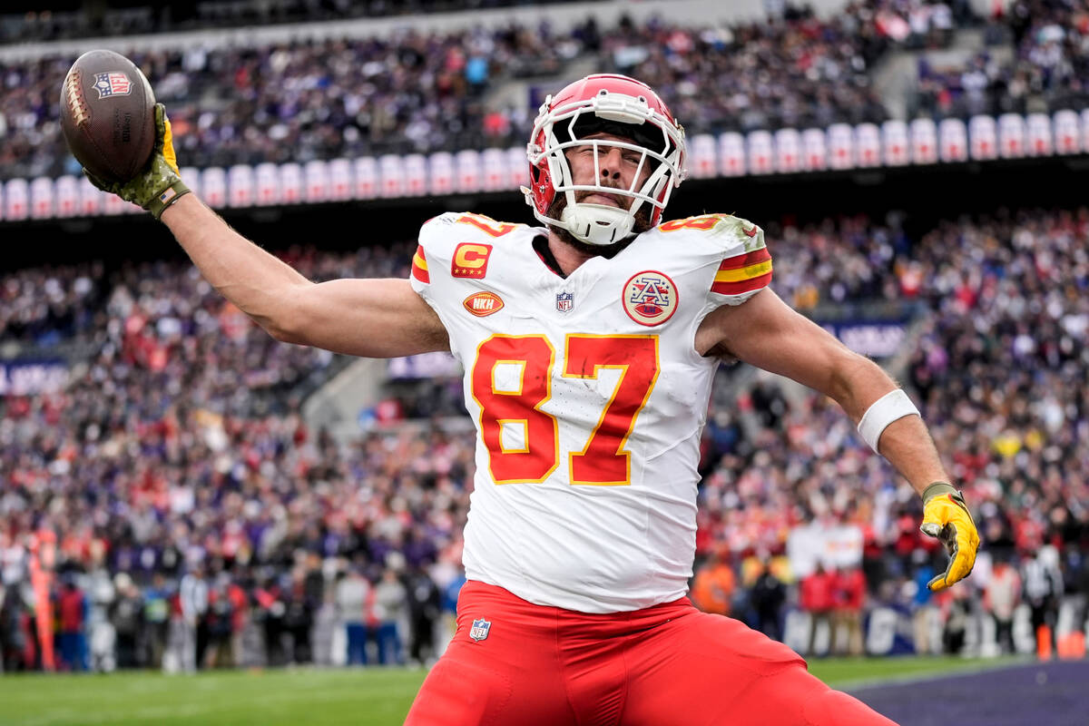 Kansas City Chiefs tight end Travis Kelce (87) celebrates his touchdown against the Baltimore R ...