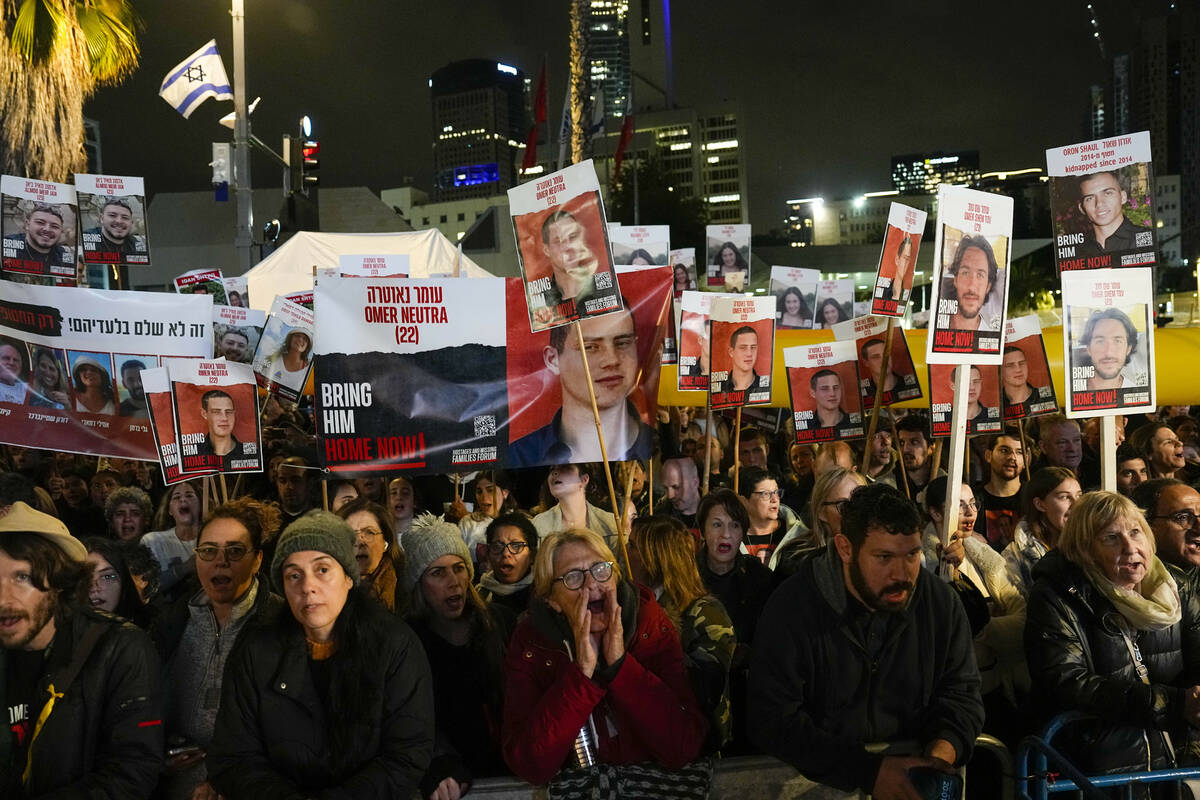 People attend a demonstration demanding the release of the hostages taken by Hamas militants in ...