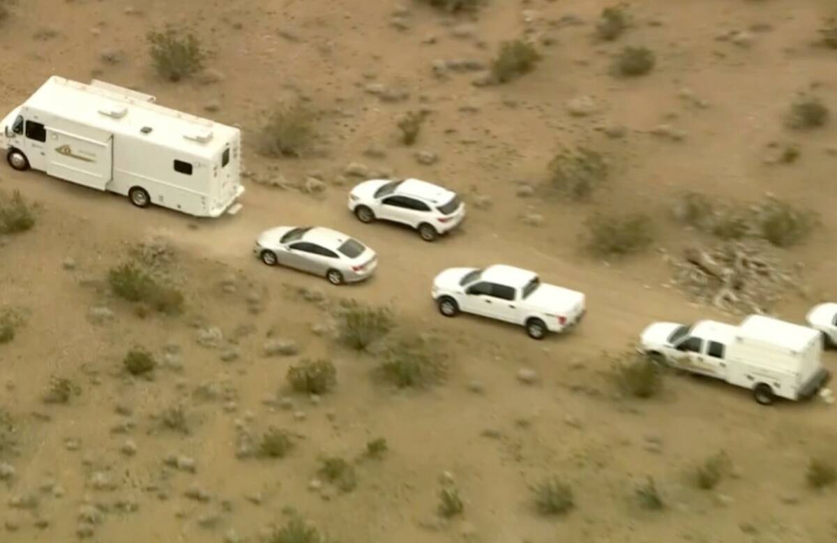 This aerial still image from video provided by KTLA shows law enforcement vehicles where severa ...