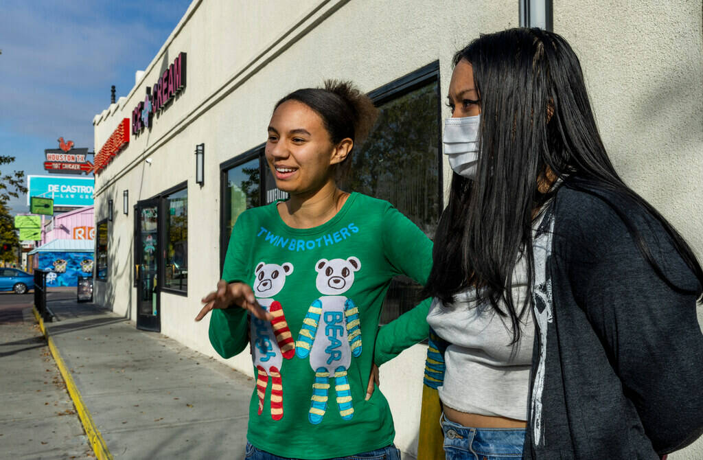 Nevada voters Kya Johnson, left, and Megan Yamat talk about the two nominating processes, the c ...