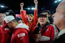 Taylor Swift, left, and Donna Kelce watch the Kansas City Chiefs receive the Lamar Hunt trophey ...