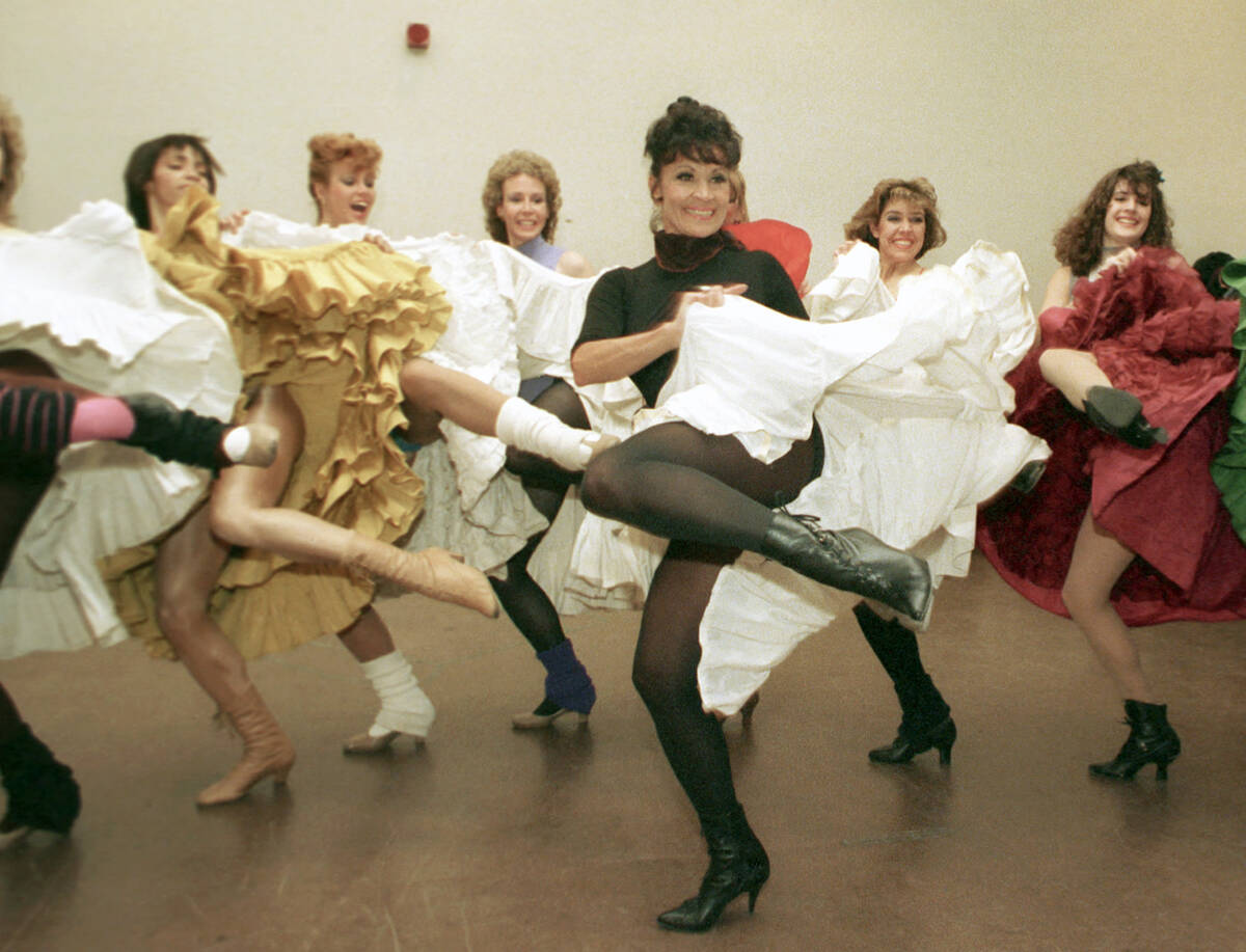 FILE - Broadway star Chita Rivera, foreground, and the Radio City Music Hall Rockettes rehearse ...