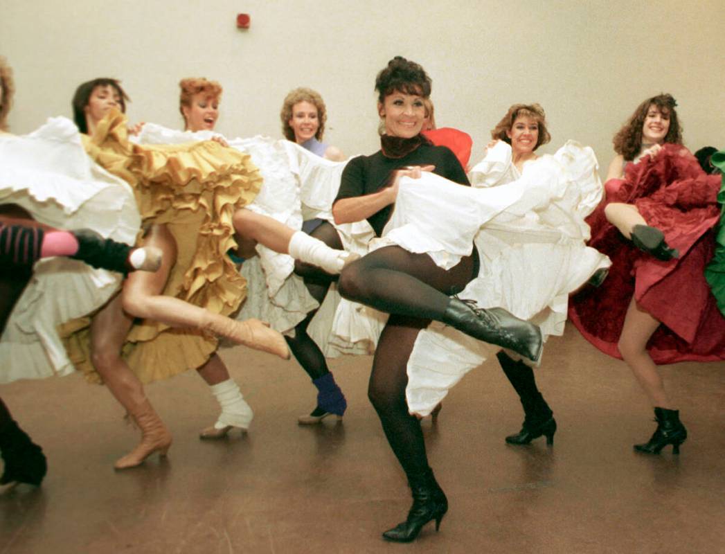 FILE - Broadway star Chita Rivera, foreground, and the Radio City Music Hall Rockettes rehearse ...