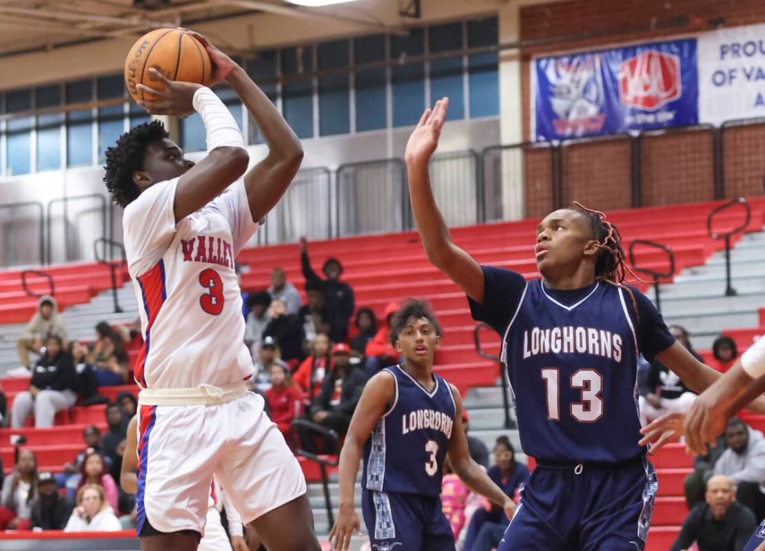 Valley's Elijah Flowers (3) shoots against Legacy's Rahjon Chambers (13) during the first half ...