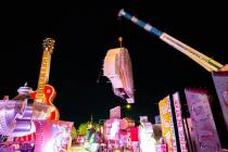 A large portion of a 1970s Flamingo Hotel & Casino sign is moved by crane on Tuesday, Jan. 30, ...