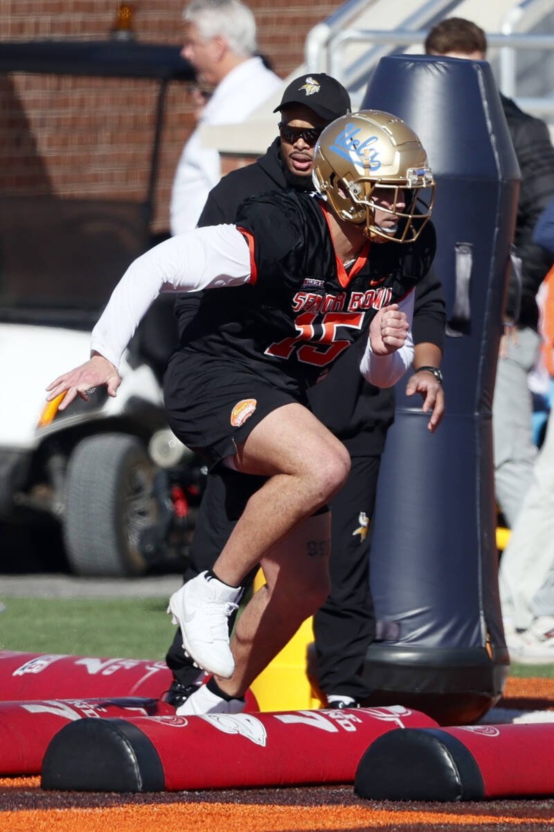 National edge Laiatu Latu of Ucla runs through drills during practice for the Senior Bowl NCAA ...