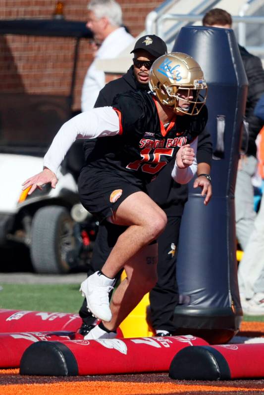 National edge Laiatu Latu of Ucla runs through drills during practice for the Senior Bowl NCAA ...