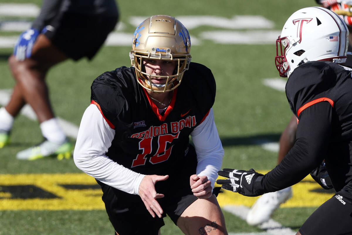 National edge Laiatu Latu of Ucla runs through drills during practice for the Senior Bowl NCAA ...