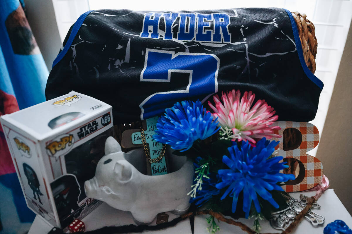 A memorial for Aiden Hyder, 14, and his brother, Adrian Hyder, 15, is seen inside of a memorial ...