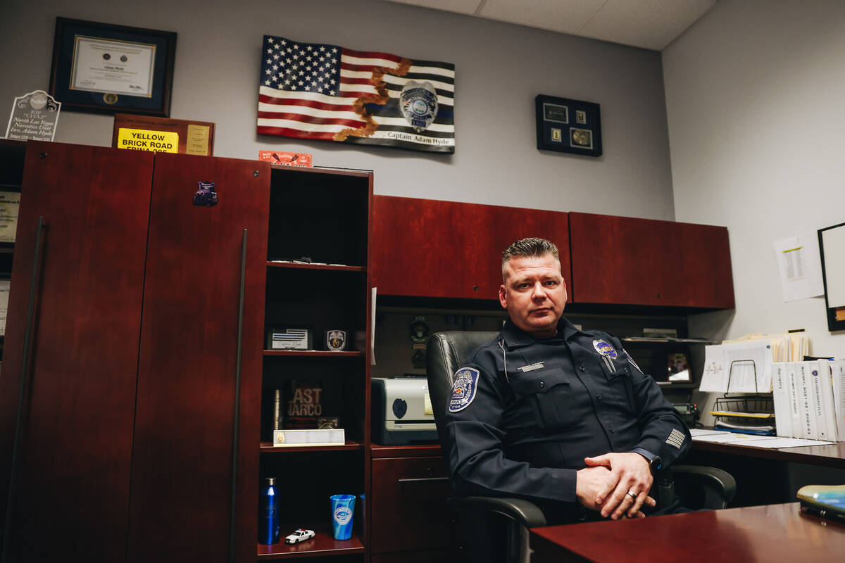 North Las Vegas Police Department Capt. Adam Hyde poses for a portrait inside of his office at ...