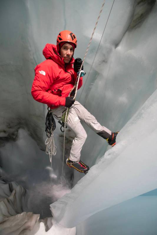 Alex Honnold in a moulin. (photo credit: National Geographic/Mikey Schaefer)