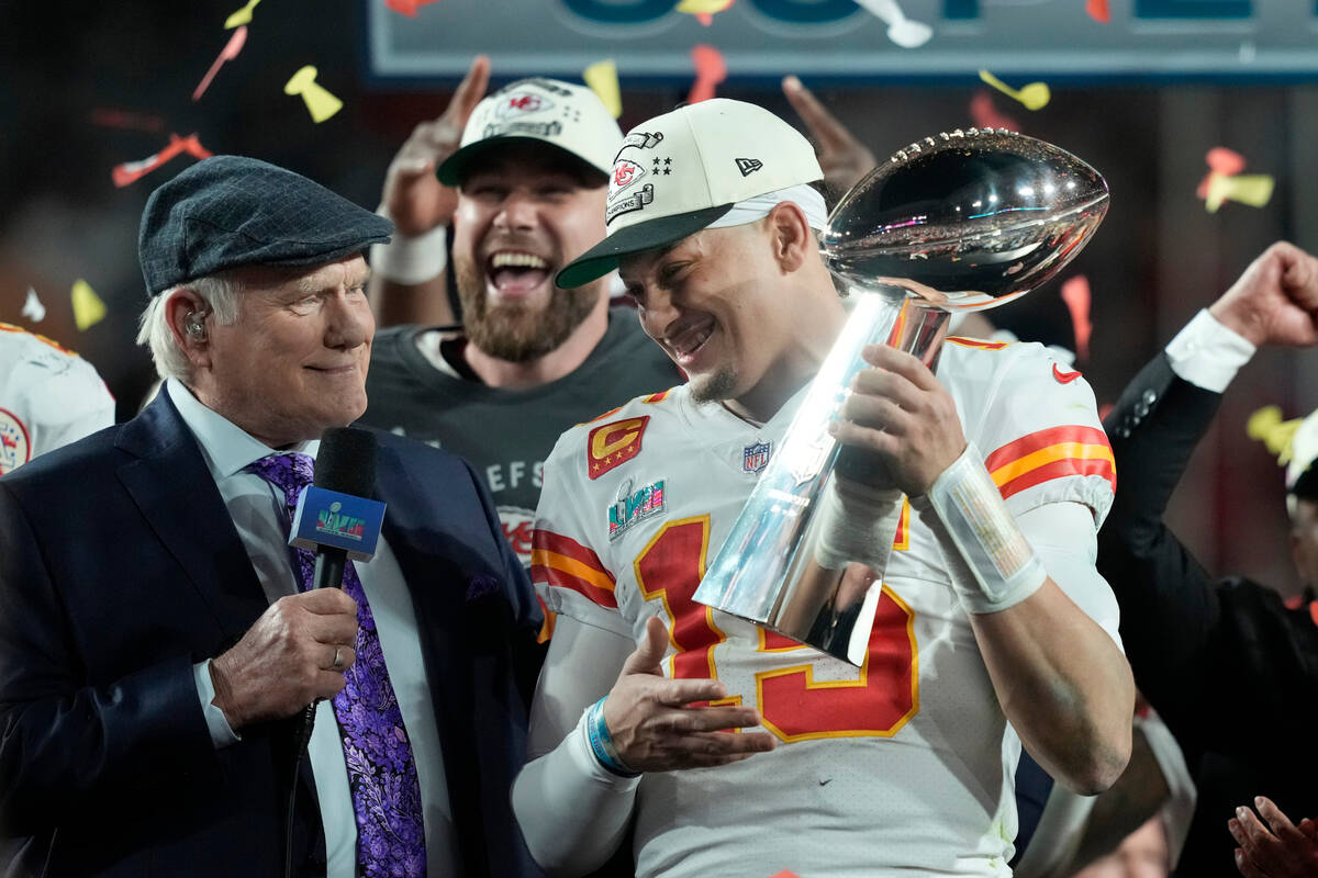 Kansas City Chiefs quarterback Patrick Mahomes (15) is interviewed by Terry Bradshaw while hold ...