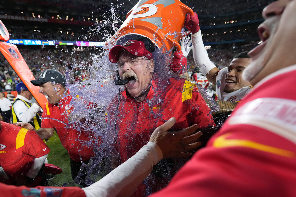 Kansas City Chiefs head coach Andy Reid is dunked after their win against the Philadelphia Eagl ...
