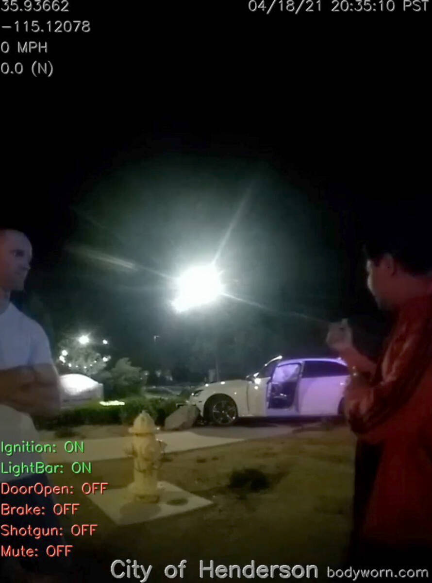A screen grab of police body camera footage shows witnesses standing near officer Katherine Coc ...