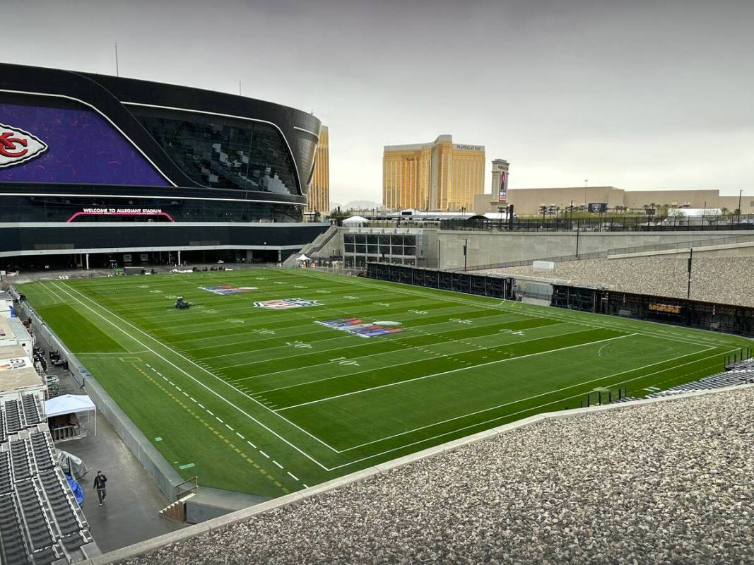 Crews prep the field at Allegiant Stadium on Thursday, Feb. 01, 2024, ahead of Super Bowl 58. ( ...