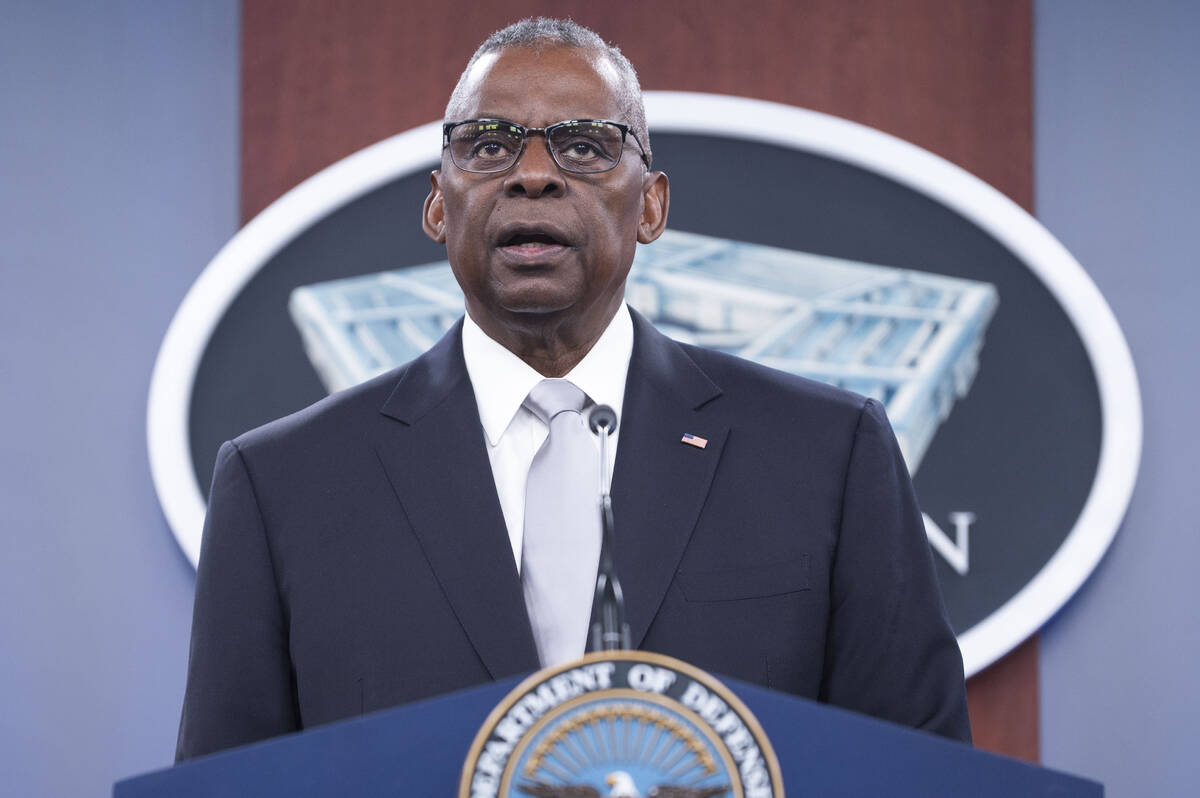 Defense Secretary Lloyd Austin speaks during a Pentagon press briefing at the Pentagon on Thurs ...