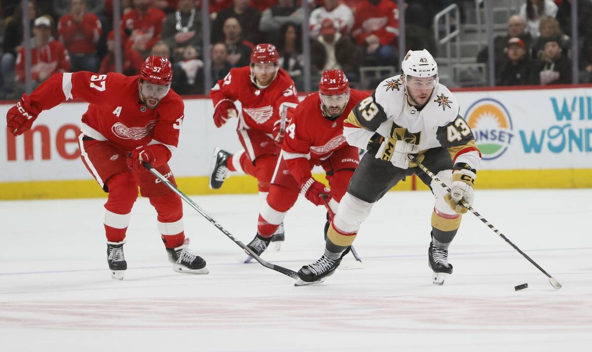 Vegas Golden Knights center Paul Cotter (43) is pursued up the ice by, from left, Detroit Red W ...