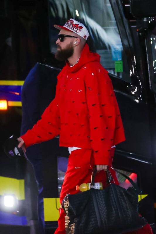 Kansas City Chiefs tight end Travis Kelce arrives at the Harry Reid International Airport along ...