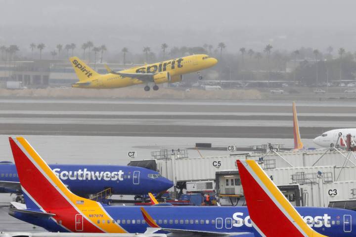 Fog lingers over Harry Reid International Airport as a Spirit Airways jet takes off Monday, Jan ...