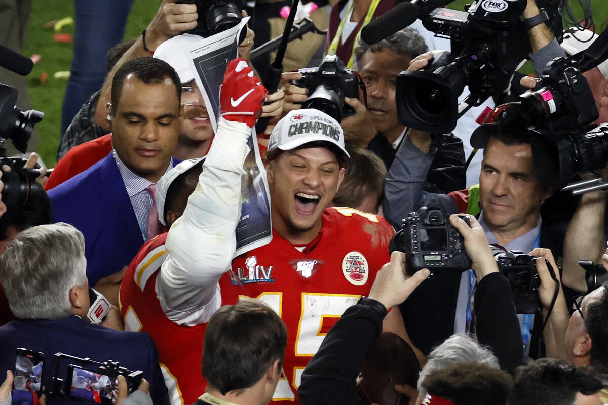 Kansas City Chiefs quarterback Patrick Mahomes (15) celebrates after defeating the San Francisc ...