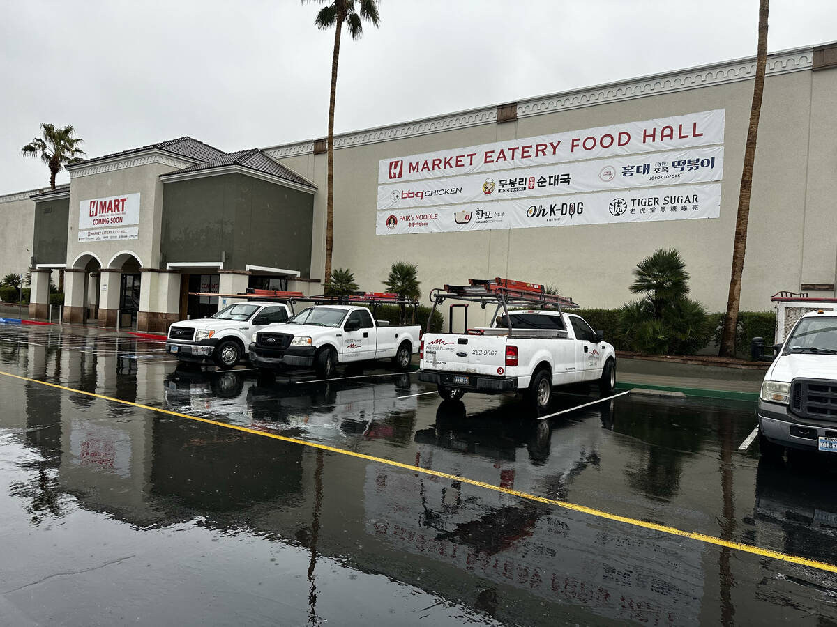 A banner that lists the tenants of the H Mart food hall which will be located in the Korean gro ...