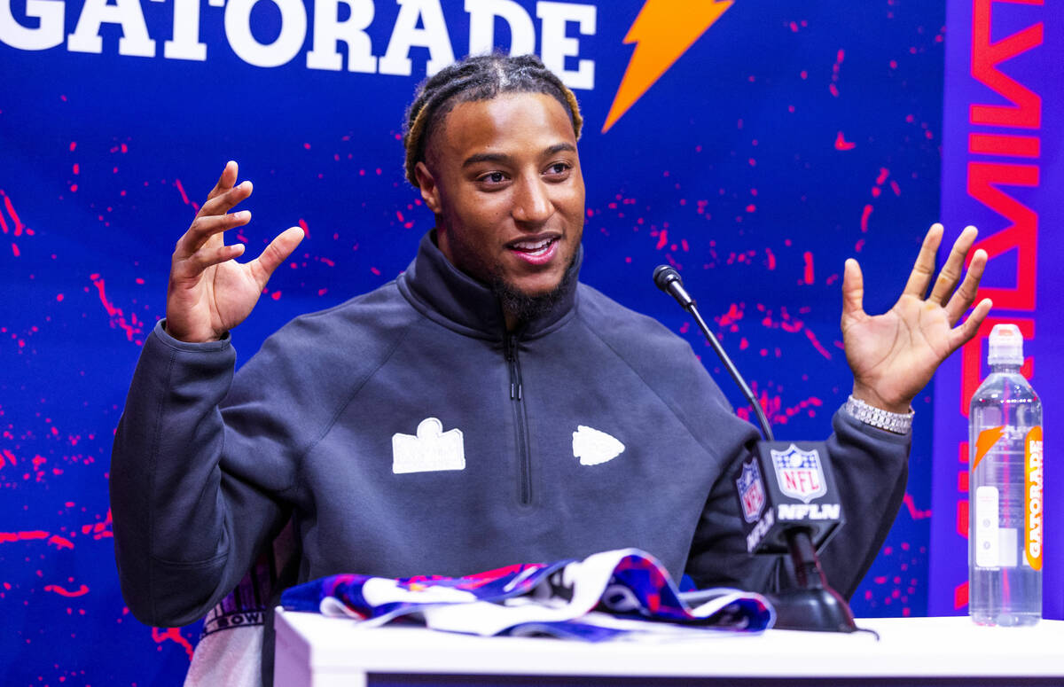 Kansas City Chiefs player Justin Reid answers a media member's question on the field during the ...