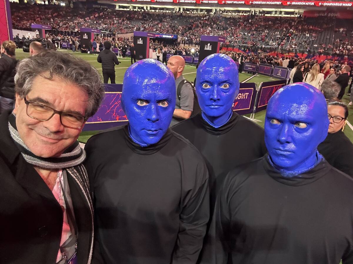 Members of the Blue Man Group are shown with Review-Journal columnist John Katsilometes Super B ...