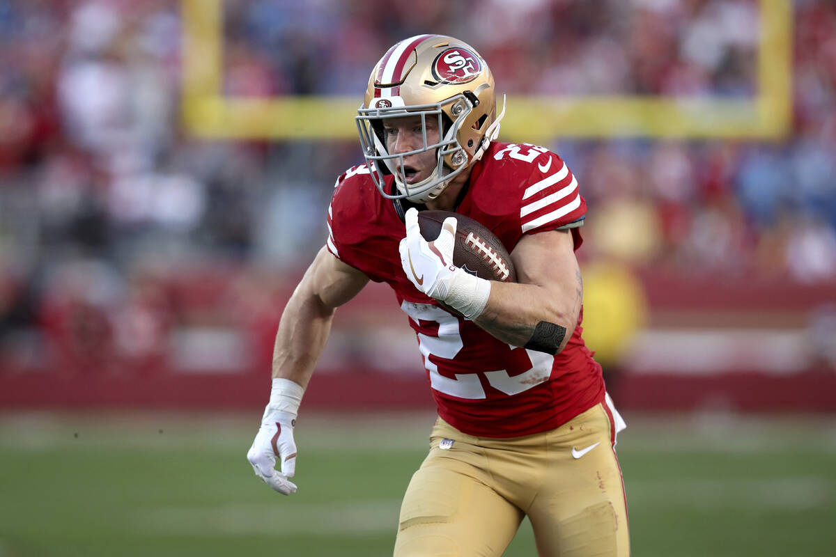 San Francisco 49ers running back Christian McCaffrey (23) runs during the NFC Championship NFL ...