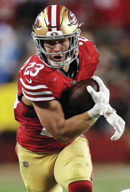 San Francisco 49ers running back Christian McCaffrey (23) runs during the NFC Championship NFL ...