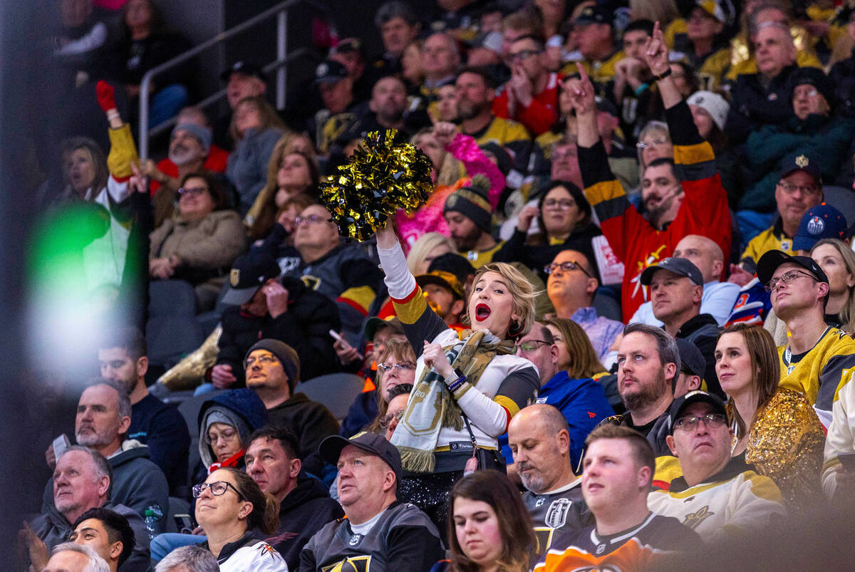 A Golden Knights fan dances against the Edmonton Oilers during the third period of their NHL g ...